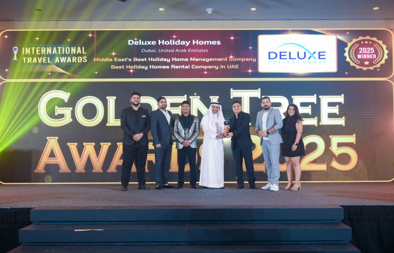 deluxe holiday team winning award at Golden Tree Awards 2025