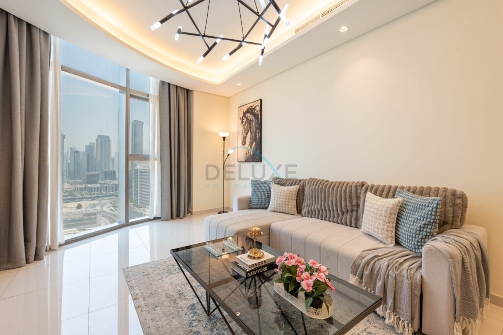 Prime High-Floor 2BR Retreat with Stunning Burj Khalifa Views, Near the Metro and Dubai’s Top Attraction, Paramount Tower Hotel and Residence