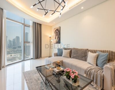 Prime High-Floor 2BR Retreat with Stunning Burj Khalifa Views, Near the Metro and Dubai’s Top Attraction, Paramount Tower Hotel and Residence
